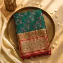 Elegant Green Peacock Motif Silk Saree with Zari Border