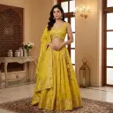 Radiant Yellow Hand-Embroidered Mirror Work Banarasi Silk Lehenga Set