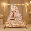 Women's Champagne Pink Lehenga Choli with Circular Embroidery and Matching Dupatta