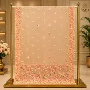 Peach Sheer Saree with Pink Floral Embroidery and Ornate Border