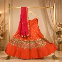 Women's Orange Lehenga Choli with Gold Embroidery and Pink Dupatta