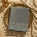 Elegant Grey Striped Saree with Intricate Zari Embroidery