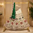 Women's Ivory Lehenga Choli with Elephant Embroidery and Green Dupatta