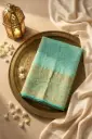Sea Green Georgette Bandhani Saree with Gold Zari Border