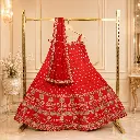 Women's Coral Red Bridal Lehenga Choli with Gold Floral Embroidery and Matching Dupatta