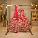 Women's Red Bridal Lehenga Choli with Heavy Embroidery and Net Dupatta