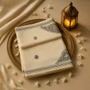 Elegant Off-White Silk Saree with Black Floral Embroidery