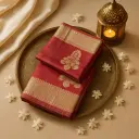 Elegant Maroon Designer Saree with Ornate Zari Border