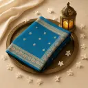 Elegant Teal Silk Saree with Intricate Gold Zari Border